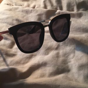 Sunglasses new with tag black and gold